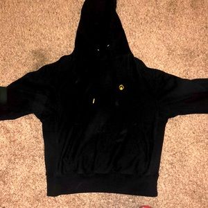 Unknwn black hoodie. Company owned by Lebron